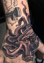 Freehand Octopus hand tattoo