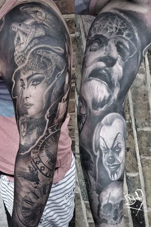 Impressive black and gray realism sleeve tattoo featuring a snake intertwined with a powerful woman, by Mauro Imperatori.
