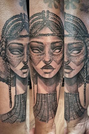 Showcase your love for blackwork tattoos with this stunning woman motif inked on your forearm by Mauro Imperatori.