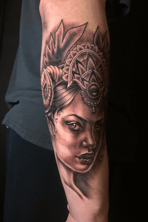 Devil girl head, client was on blood thinners so the tattoo is a bit red.