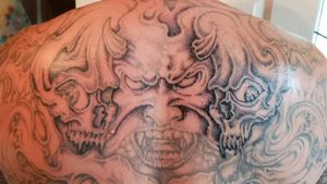 I'm going project with backpiece black and Gray Touching up and fixing old work from other artists