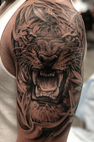 Finished up this big ass tiger for one of the neighbors by the shop. First tattoo...Adding some flowers and Fu dogs to the bottom sleeve. Never get tired of tattooing tigres! Or any animals...who’s next?!? #skanvas #peaces #tigertattoo #animaltattoo #bng #blackandgrey #realism #illustrative #arte #inked #portraitmode #oc #cypress @hardliferotaries