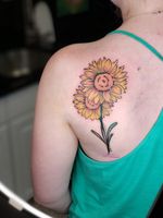 Color sunflower on shoulder