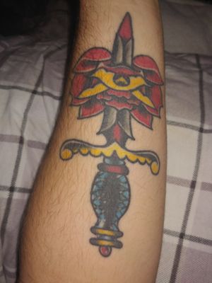Traditional Dagger and Rose in need of a touch up.