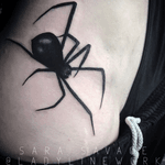 Black work spider tattoo