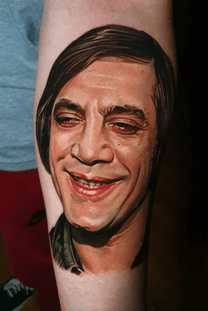 Javier Bardell as Anton Chigurh in No Country for Old Men. 