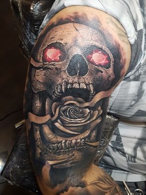 Skull with rose and diamond eyes