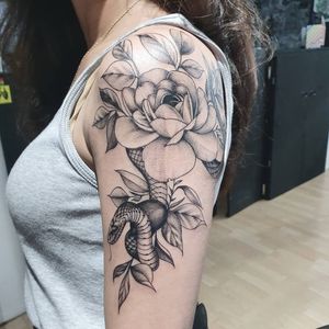 Lineart tattoo with snake and peony.