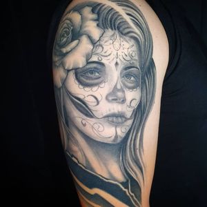 La catrina, healed on upper arm.