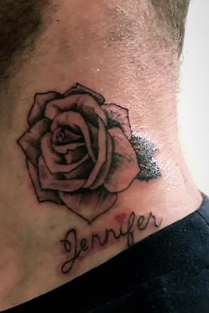 Rose n name tattoo on neck