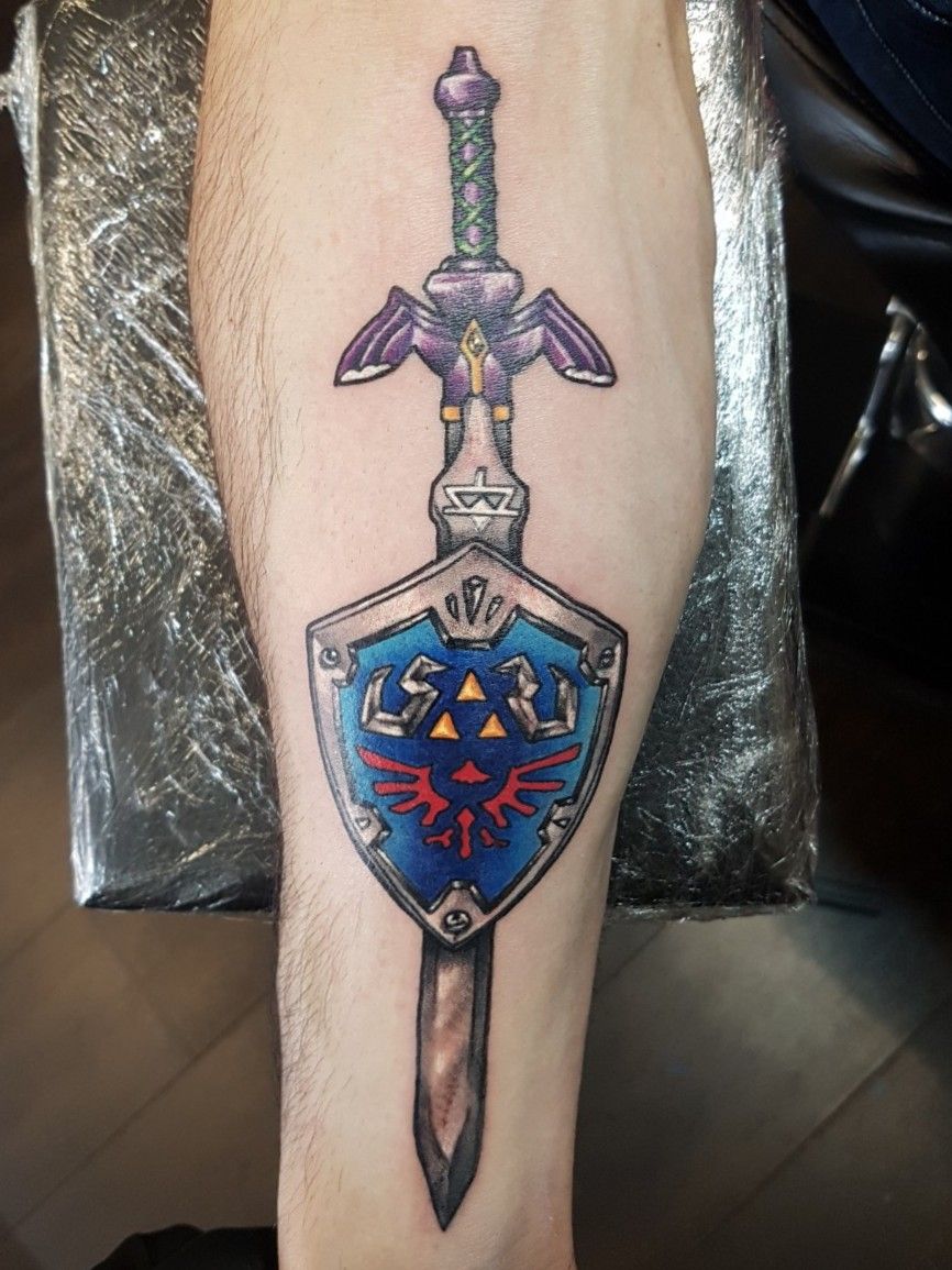Tattoo uploaded by Red X ink • Color piece / sword and shield • Tattoodo
