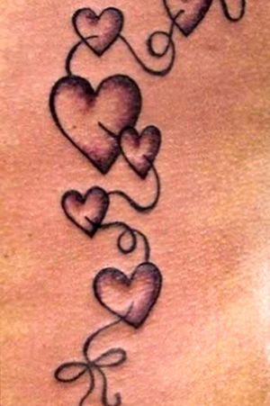 interlocking heart tattoo
