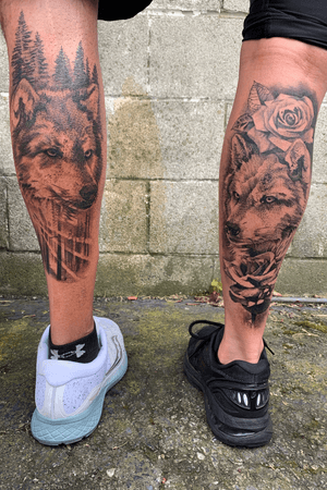 Couples tattoo with two wolves that look at each other when they stand side-by-side. These were made over two back-to-back days, 8-10 hours each. 