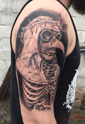 Plague Doctor outer half sleeve for his first tattoo. Done in one 12 hour session. 