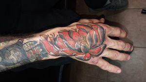 Lotus flower by Ashley Grove at Sin Parlor in Fayetteville NC. Got this tattoo back in February. #lotusflower #lotustattoo #handtattoo #floral #flower #flowertattoo 