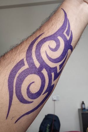 Tribal inner forearm tattoo.. Inked with blue ball point pen