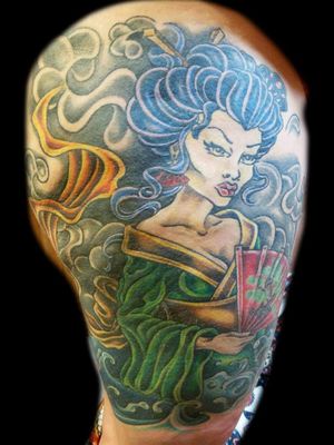 This photo was taken after 5 years. Healed tattoo of a Geisha. Also, originally a cover-up.
