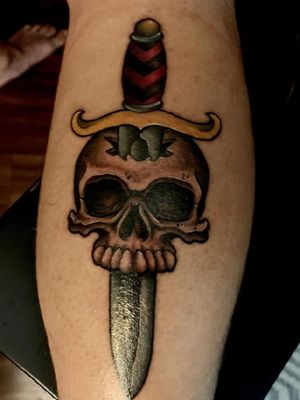 Skull with knife 