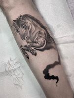 Admire Alejandro Gonzalez's stunning black & gray horse design on your forearm. Let this majestic creature symbolize strength and freedom.