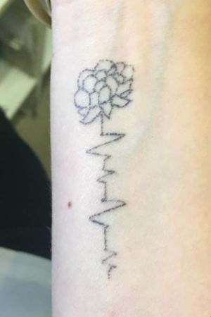 #handpoked flower done by me on wrist