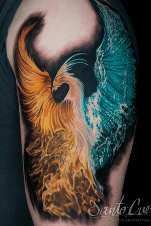 Get a stunning watercolor phoenix tattoo on your upper arm by artist Alex Santo. Stand out with this bold and colorful design!