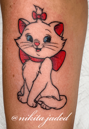 Marie from aristocats on the inner arm 