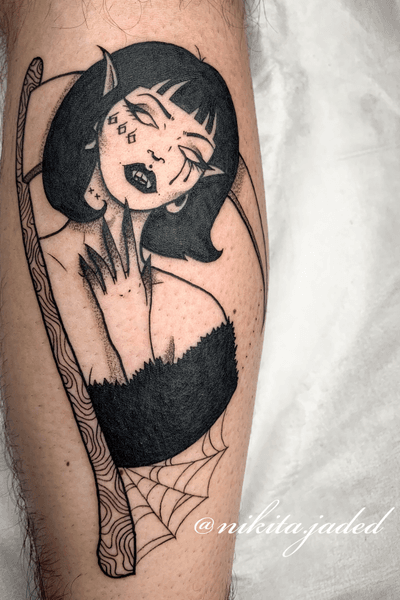 Custom drawn vampire lady and sickle on the calf 
