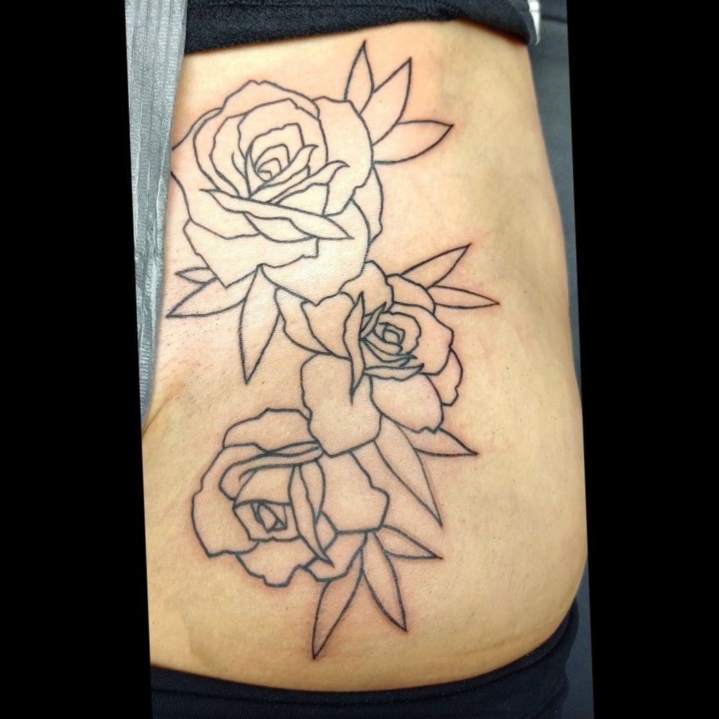 rose hip and thigh tattoos