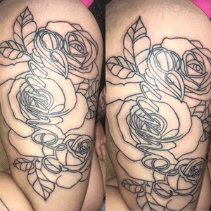 Custom Rose (thigh piece) with the name JUNIOR going through it