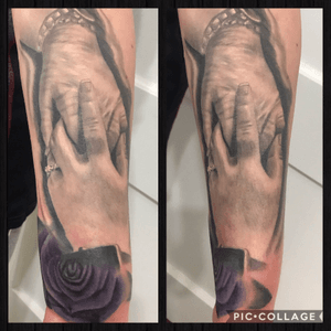 Black and gray realistic mother/daughter hands on inner forearm