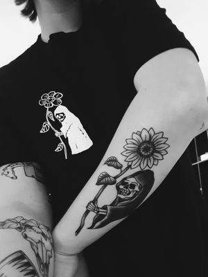 Death with a flower.