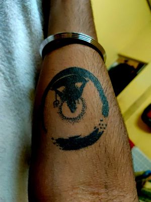 Shiva tattoo wit zen circle