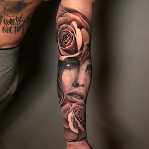 Woman portrait surrounded by roses sleeve tattoo, London, UK | #blackandgreytattoos #sleevetattoos #portraittattoos #rosetattoo #realistictattoos