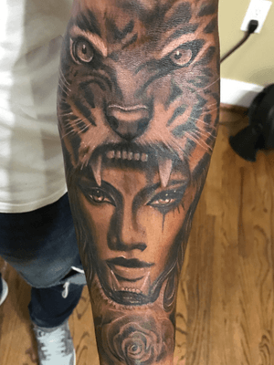 Black and gray beauty with tiger head dress on inner fore arm...enjoy