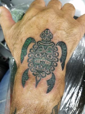 Haida turtle hand tat. On an older fellow, but still clean AF!