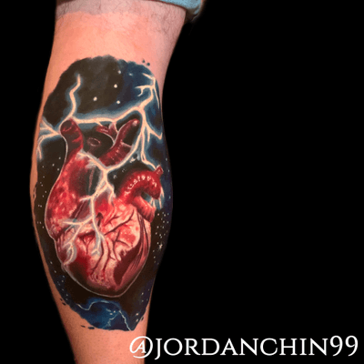 Memorial tattoo for my client. His mom had an old school heart with blue lighting so he got this to remember her by!