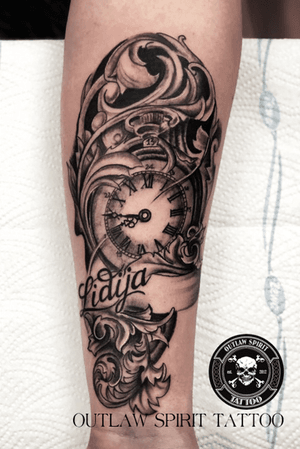 Name and clock tattoo
