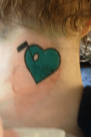 My very first tattoo I got when I was 21 representing love and music.