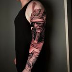 Black and grey realistic samurai portrait full sleeve tattoo, London, UK | #bestrealistictattoos #bestblackandgreytattoos #fullsleevetattoos #samuraitattoos #sleevetattoos