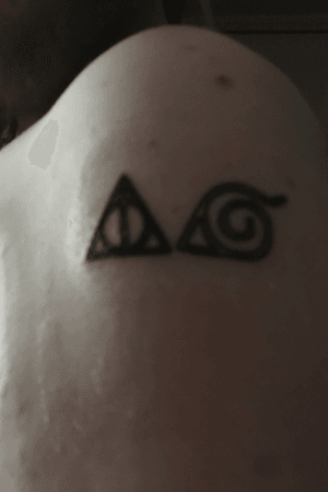 My first 2 tattoos. The Deathly Hallows symbol from Harry Potter and the Leaf Village symbol from Naruto. Got them done at a charity drive. 