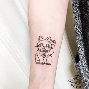 Lucky Cat Linework Tattoo by Kirstie Trew @ KTREW Tattoo • Birmingham UK 🇬🇧 #lineworktattoo #fineline #cat #cattattoo #cats #luckycattattoo #tattoo #birminghamuk