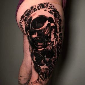 Black and grey realistic leg tattoo of gas mask and skulls, London, UK | #blackandgrey #realistic #skulltattoos #legtattoo