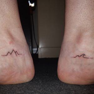 Inside of the ankle. My two homes, the mountains and the sea. Simple. Minimal lines. Empire Tattoos in Cozumel Mexico. Amazing artists! 
