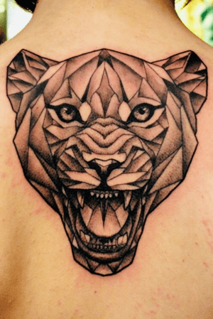 •First tattoo done in 2015 by Dusty Brasseur• #lioness #liontattoo #blackAndWhite #geometric #backpiece 