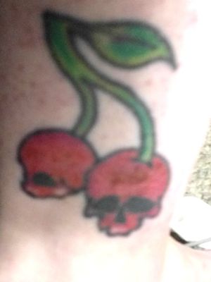 Skull Cherries. Groupon, never again. This ankle ink never healed correctly. Never going back to Twisted Ink on McCarty Rd by Fitzgerald's 