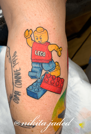 LEGO man tattoo on the forearm 