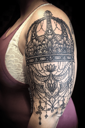 Crown and jewelry tattoo
