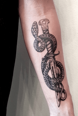 Snake&dagger! My first tattoo. Taken summer 2019. #snake #dagger #snakeanddagger 
