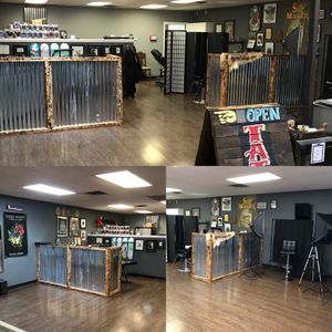 Crowned Raven Tattoo, Inc. Inside with tattoo booths and a photography booth to take those professional grade photos of your new bad ass tattoos . located in Osceola, Indiana. Right next to Elkhart, MISHAWAKA, South Bend, Granger, Notre Dame Indiana, and South Western Michigan 