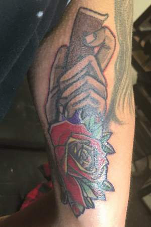 Hand and dagger on tricep 